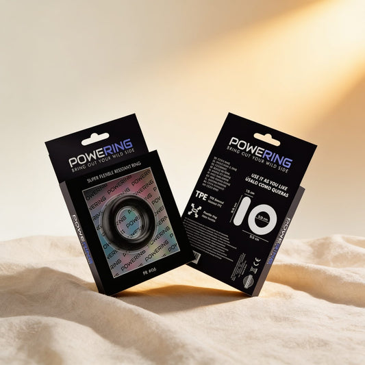 ANNEAU PÉNIS SUPER FLEXIBLE ET RÉSISTANT 5,5CM PR06 NOIR — photo éditoriale sur lin drapé