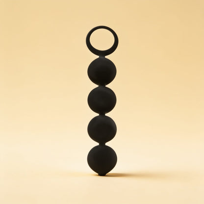 CHAPELET ANAL LENNON 4 SPHÈRES SILICONE 15 CM — packshot studio sur fond crème