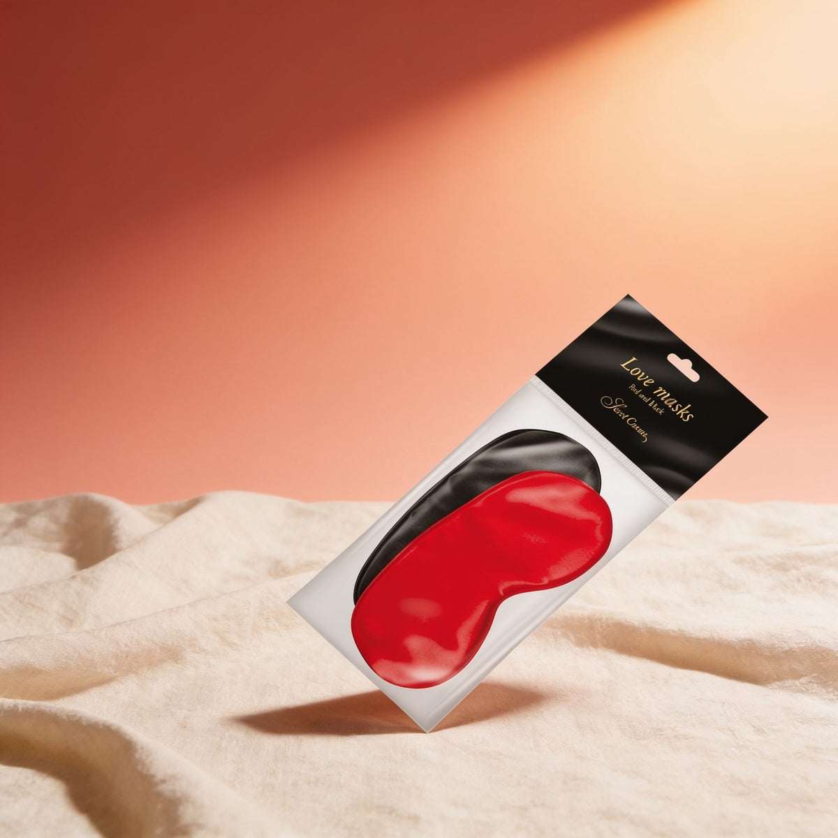 LOVE MASKS RED AND BLACK — photo éditoriale sur lin drapé