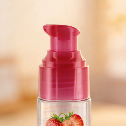 Détail du pousse-dose et du graphisme fraise