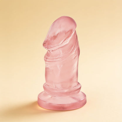 Plug anal réaliste Jelly rose — packshot studio sur fond crème