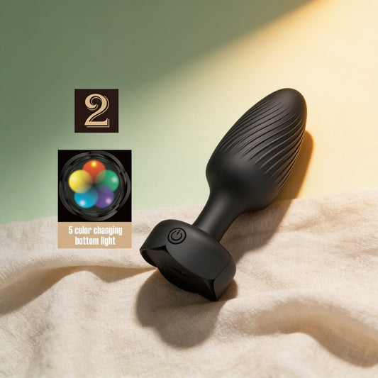 PLUG ANAL VARIAN AVEC LUMIÈRE LED NOIR 10,8 CM — photo éditoriale sur lin drapé