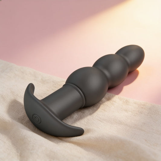 Plug anal vibrant  Aeaeas — photo éditoriale sur lin drapé